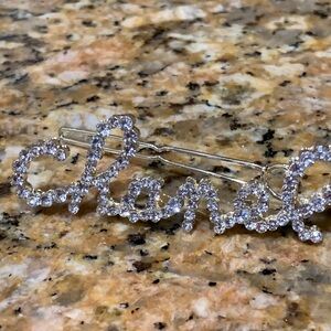 Absolutely stunning Chanel hair clip with Crystals in writing Chanel ,must have!